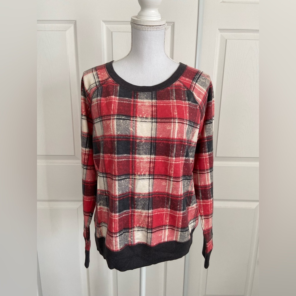 Faded red plaid sweater